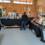 Art auction setup inside the Windgate Iron and Wood Studio at Hands On ESSA 2026