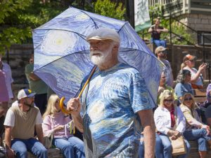 Participant dressed in a Van Gogh-inspired costume during the ArtRageous Parade in Eureka Springs, Arkansas