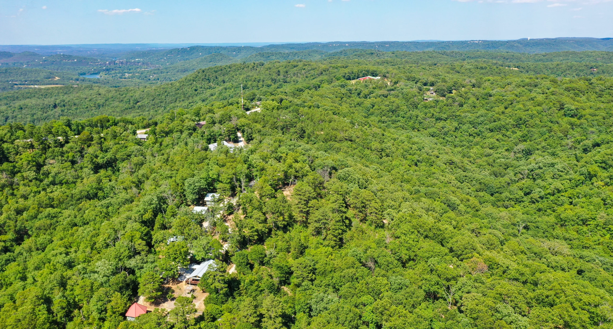 Aerial view of the Eureka Springs School of the Arts campus surrounded by the Ozark Mountains in Arkansas